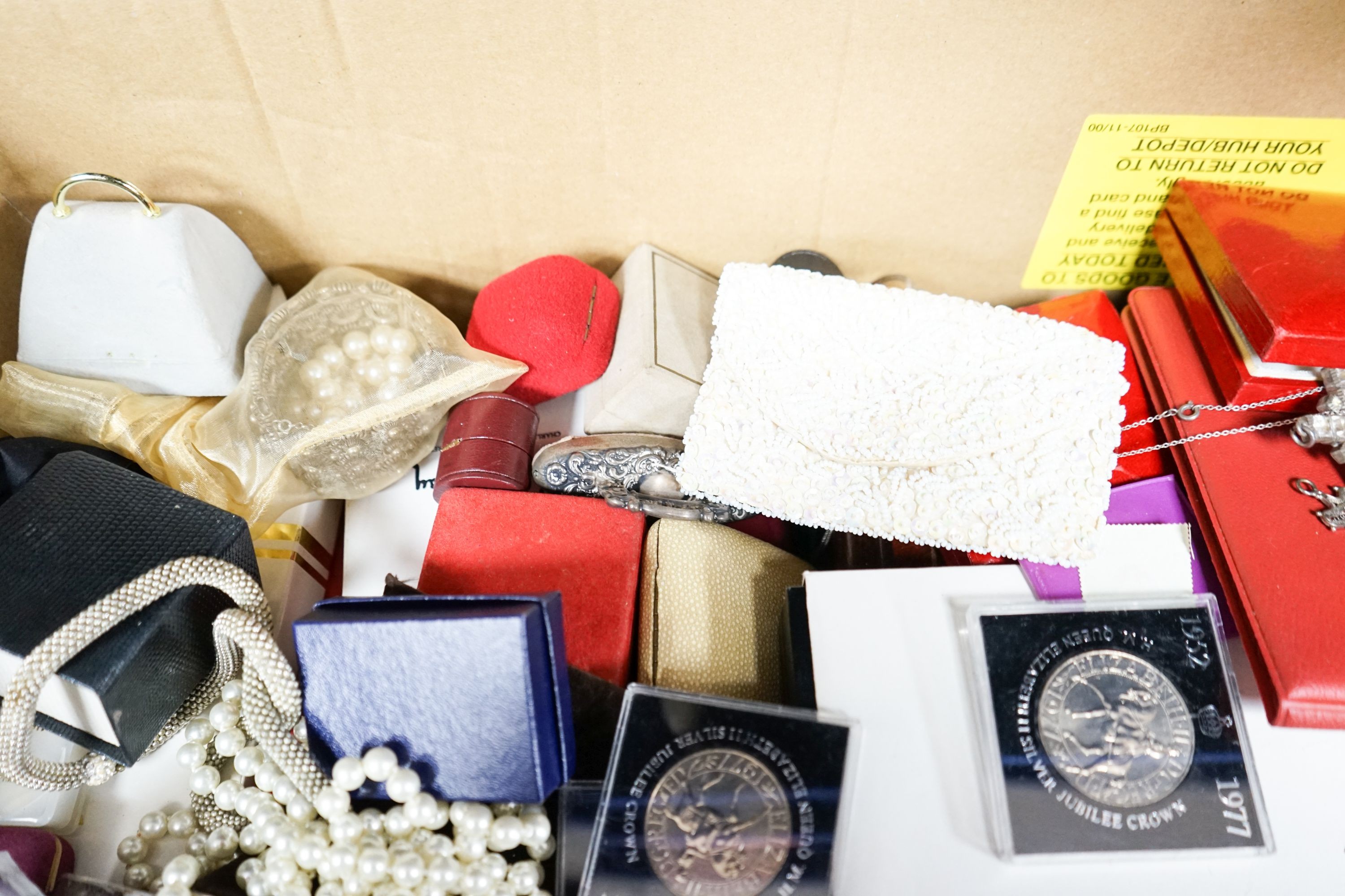 A group of assorted costume jewellery etc. including some small silver, a 9ct gold and two stone cultured pearl crossover ring, a yellow metal overlaid spy glass, commemorative coins and a large yellow metal mounted oval